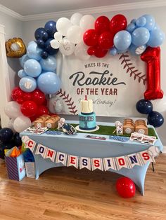 a baseball themed birthday party with balloons and decorations