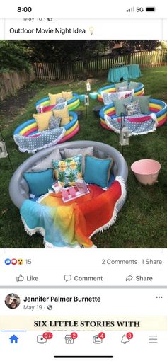 an instagramted photo of a backyard party with lots of furniture and decorations on the lawn