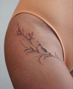 Inner Thigh Hip Tattoo, Underbreast Tattoo Fine Line, Large Lavender Tattoo, Fine Line Flower Hip Tattoo, Hip Flexor Tattoo, Flower Tattoos Sternum, December Birth Flower Spine Tattoo, Fine Line Ribcage Tattoo, Leg Tattoos Women Fine Line