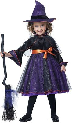 Hocus Pocus Toddler Witch Costume She brightens your day with a few magic words. The Hocus Pocus toddler costume is a dress decorated with a glitter sheen skirt overlay. It comes with hat, belt with attached bow and caplet with attached collar. Shoes, tights and broom are not included. Hocus Pocus Toddler Witch Costume She brightens your day with a few magic words. The Hocus Pocus toddler costume is a dress decorated with a glitter sheen skirt overlay. It comes with hat, belt with attached bow a Hocus Pocus Witch Costume, Toddler Witch Costumes, Hocus Pocus Costume, Toddler Costumes Girl, Hocus Pocus Witches, Classic Halloween Costumes, California Costumes, Witch Costumes, Witch Girl