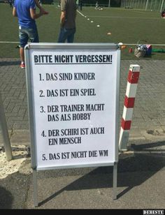 a sign that is on the side of a road with words written in german and english