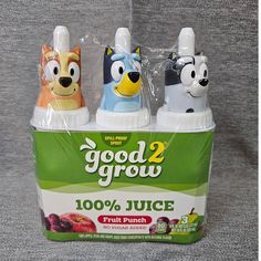 three bottles of juice with cartoon animals on them