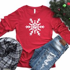 Get in the spirit of the Christmas season with this simple distressed snowflake long sleeve graphic tee. Perfect for Christmas morning or a day at the Christmas Tree Farm, or all winter long. This cute Christmas T-shirt is so adorable for your Christmas and winter festivities! Our shirts are great for the fall season and would make a great gift.  Are you looking for your new favorite t-shirt? Our graphic tees are custom created specifically for you and made by me not sourced out to a print shop. Snowflake Shirt, Merry And Bright Shirt, Merry And Bright Christmas, Single Shirt, Christmas Tshirt, Nature Shirts, Bright Christmas, Winter Shirts, Snowflake Christmas