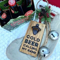 a bottle opener and some christmas decorations on a table