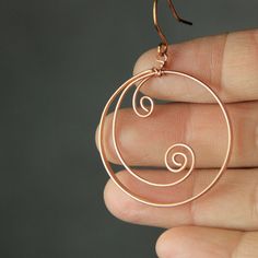 Ocean wave double scroll 14k rose gold filled by AnniDesignsllc Handmade Spiral Earrings For Everyday Wear, Handmade Spiral Wrap Earrings Gift, Handmade Spiral Minimalist Jewelry, Wire Wrapped Metal Hoop Earrings, Nickel Free Spiral Hoop Earrings Gift, Handmade Spiral Wire Jewelry, Handmade Minimalist Spiral Jewelry, Minimalist Handmade Spiral Jewelry, Unique Spiral Hoop Earrings Gift