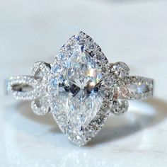 an engagement ring with two pear shaped diamonds