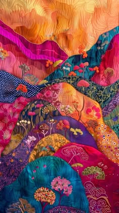 an abstract painting with many different colors and patterns on the fabric, as well as flowers