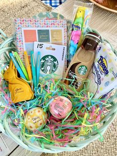 a basket filled with lots of items on top of a table