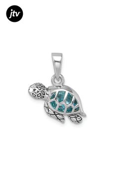 Rhodium over sterling silver polished and antiqued finish swimming turtle pendant with blue crystal. Measures approximately 13/16"L x 5/8"W. Blue Sterling Silver Jewelry With Oxidized Finish, Blue Oxidized Sterling Silver Jewelry, Silver Sterling Silver Turtle Jewelry, Nickel-free Silver Turtle Jewelry, Silver Turtle Jewelry, Silver Turtle Jewelry Gift, Silver Turtle Jewelry For Gifts, Swimming Turtle, Turtle Pendant