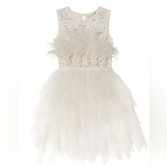 Tutu Du Monde Holiday Snow Princess Tutu Dress - Milk This Tutu Dress Features A Beautiful Tank Style Soft Cotton Bodice Is Embellished With A Scattering Of Sparkling Beads And Sequins. Plumes Of Silky Soft Ostrich Feathers Burst From The Waistline. It Also Features One Button Closure At The Back Neck For Ease Of Wear And A Knee-Length Style Skirt Which Falls Vertically In Gathered Tulle Layers For A High-Volume Silhouette. Size 10 - 11 In Milk White Sister Set? Message If Interested In Both Nwo Elegant White Princess Dress For Summer, Elegant White Summer Princess Dress, White Feathered Mini Dress For Summer, White Princess Dress For Summer Party, Elegant Feather Trim Dresses For Dress-up, White Sleeveless Princess Dress With Ruffles, Elegant Dress With Feather Trim For Dress-up, White Feather Trim Mini Dress For Spring, White Fitted Princess Dress For Summer