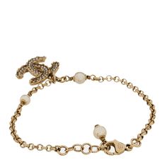 This is an authentic CHANEL Pearl CC Bracelet in Light Gold. This stylish bracelet is crafted of gold links and faux pearls and features a textured gold CC logo with small pearls. Chanel Pearl, Chanel Pearls, Stylish Bracelet, Chanel Jewelry, Cc Logo, Gold Texture, Faux Pearl, Jewelry Box, Chanel