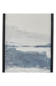 an abstract painting with blue and white colors on the water, framed in black frame