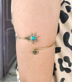 Turquoise Sun Adjustable Gold Arm Bracelet - Tribal Gemstone Crystal Festival Boho Jewelry, Upper arm cuff Metal:-Brass Handmade jewelry ❥ Customers satisfaction is our biggest priority, please contact us with any questions/queries for future or existing orders, and we will do our best to make sure you are happy with your order. ❥Please make sure to add the correct address during check out. You can return your purchased item within 15 days after successful delivery. We offer a 100% "Money Back G Adjustable Turquoise Metal Cuff Bracelet, Bohemian Turquoise Metal Cuff Bracelet, Adjustable Bohemian Metal Body Jewelry, Turquoise Bracelet For Festivals, Turquoise Bracelet For Festival, Bohemian Resizable Bangle Cuff Bracelet, Adjustable Turquoise Cuff Bracelet For Festivals, Adjustable Blue Cuff Bracelet For Festivals, Adjustable Metal Bohemian Cuff Bracelet