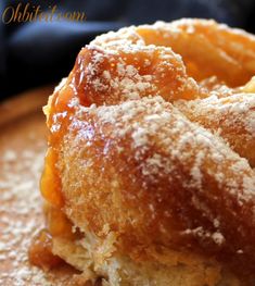 a doughnut with powdered sugar on top