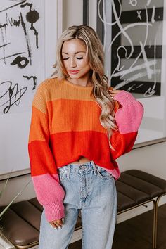 - Staying stylish is a breeze with this adorable sweater! - Unlined knit material with a tangerine, camel, red, and pink hued striped pattern - A crew cut neckline - Long, loose sleeves with fitted ribbed cuffs - A relaxed silhouette that ends in a straight hemline Striped Colorful Sweater, Spring Orange Color Block Sweater, Multicolored Striped Sweater, Orange Striped Sweater, Long Sweater Rainbow Stripe Sleeve, Striped Sweater Outfit, Emma Style, Spring Breeze, Orange Sweaters