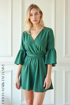 Olivia Mark - Elegant Emerald Green Wrap Dress with Bell Sleeves and Elastic Waist Solid Bell Sleeve Dresses For Spring, Spring Solid Color Dress With Bell Sleeves, Spring Solid Color Bell Sleeve Dress, Green Wrap Dress, Emerald Green Dress, Dress With Bell Sleeves, Emerald Green Dresses, Green Wrap, Inner Goddess