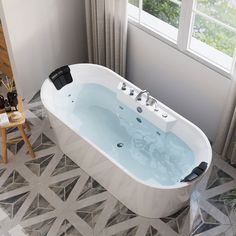 a bathroom with a large bathtub in the middle of it and a chair next to it