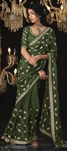 Green color Saree in Silk fabric with Embroidered, Sequence, Thread work Green Embroidered Fabric For Reception, Green Georgette Embroidered Fabric For Reception, Green Embroidered Georgette Fabric For Reception, Embroidered Saree For Ceremony, Anarkali Saree With Intricate Embroidery For Ceremony, Green Resham Embroidered Blouse Piece For Wedding, Green Resham Embroidery Blouse Piece For Wedding, Green Art Silk Blouse Piece For Wedding, Elegant Green Embroidered Dola Silk Fabric