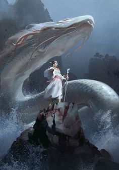 a woman standing on top of a rock next to a giant white dragon in the ocean