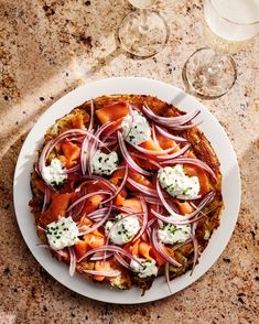 Photo: Murray Hall • Food Styling: Thu Buser. Photo: Murray Hall • Food Styling: Thu BuserThis elegant, savory pancake captures the flavors of an everything bagel topped with all the fixings.
The post Everything Potato Galette with Lox and Crème Fraîche appeared first on Saveur.