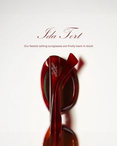 an advertisement featuring a red pair of sunglasses