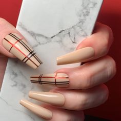 Set of 10 made to order, gel polish, press on nails. This preppy little set is in glossy nude with a Burberry inspired metallic plaid design. Shown in long coffin shape. With your order you will receive one application kit which includes: 🖤 1 mini nail file🖤 1 mini buffer🖤 1 orange wood cuticle pusher🖤 1 alcohol pad🖤 1 KDS nail glue🖤 1 sheet adhesive nail tabs🖤 Instructions Need custom sizing? Select Custom from the size drop down and let us know your sizes at checkout. Please enter your Burberry Nails Design, Bedazzle Nails, Plaid Nail Designs, Orange Wood, Coffin Shape