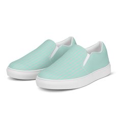 Made for comfort and ease, these Women’s Slip-On Canvas Shoes are stylish and the ideal piece for completing an outfit. Equipped with removable soft insoles and rubber outsoles, it’s also easy to adjust them for a better fit. • 100% polyester canvas upper side • Ethylene-vinyl acetate (EVA) rubber outsole • Your brand on the box, insole, and tongue of the shoe • Breathable lining, soft insole • Elastic side accents • Padded collar and tongue • Printed, cut, and handmade • Blank product sourced f Steel Blue, Canvas Shoes, Slip On, Mint, Elastic, Vinyl, Collar, Canvas, Blue