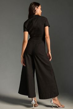 Meet the style that we're betting everyone can wear. With its too-culotte cut and faux-wrap bodice, this one-piece wonder is the one-stop-shopping serotonin boost you've been looking for. Magic Fabric It’s no illusion: This only-at-Anthro fabric is expertly engineered to sculpt as it stretches. Check out the reviews and try it on for yourself – because seeing is believing . | The Colette Wrap Jumpsuit by Maeve in Black, Women's, Size: 26W, Cotton/Linen/Viscose at Anthropologie Versatile Fitted V-neck Jumpsuits And Rompers, Versatile Fitted V-neck Jumpsuit, Fitted Wide Leg Jumpsuits And Rompers With Belt, Chic Fitted Wide-leg Jumpsuit, Fitted Wide-leg Jumpsuits For Workwear, Seeing Is Believing, Wrap Jumpsuit, You've Been, Try It