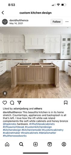 an image of a kitchen with white cabinets and wood flooring on the bottom right hand corner