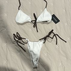 Brand New! Had Bra Padding And Adjustable Everywhere. White Adjustable Swimwear For The Beach, Adjustable White Swimwear For Beach, Adjustable White Swimwear For Pool, White Tie-side Bottom Swimwear For Vacation, White Tie-side Swimwear For Vacation, Adjustable White Swimwear For Spring, White Strappy Swimwear For Pool, White Tie-side Bottom Swimwear For Beach Season, White Strappy Swimwear For Beach Season