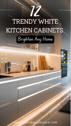 a kitchen with white cabinets and lights on the counter top is featured in this article