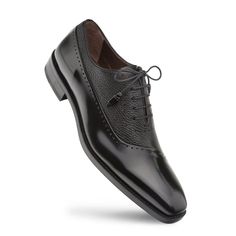 Style: Postdam-Black A Rich combination of High-Shine Calfskin & Soft, Textured Deerskin accent this lace-up Oxford from the Mezlan collection, featuring Decorative Perforations, matching Calfskin tassels, their injected comfort insole, and a full Leather sole! Handmade in Spain. Formal Slip-on Oxfords With Stitched Sole, Black Oxfords With Stitched Sole For Semi-formal Occasions, Womens Formal Shoes, Black Leather Slip-on Oxfords, Luxury Black Leather-lined Oxfords, Semi-formal Leather Oxford Shoes With Perforated Toe Box, Cordovan Shoes, Luxury Designer Shoes, Leather Dress Shoes