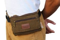 2 Zipper Pockets One magnetic inside pocket Two belt loop clippers One front zipper pocket Canvas Material 60'-inch-long canvas adjustable strap Color: Brown Measurements (L x H x W): 8 x 5 x 1 inches Casual Belt Bag With Belt Loops For Outdoor, Travel Canvas Belt Bag With Pockets, Casual Belt Bag With Pockets For Everyday Carry, Casual Everyday Carry Belt Bag With Pockets, Casual Cotton Belt Bag With Pockets, Casual Khaki Belt Bag With Pockets, Cross Body Fanny Pack, Iphone 7 Covers, Hip Pouch