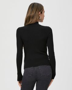 This black long sleeve high neck top is made from an incredibly soft and comfortable ribbed knit material with a flattering stitch detail at the waistline. Pair the Raisa Top with any shade of denim in your closet. Minimalist Dressing, High Neck Long Sleeve Top, Brooks Brothers Women, Flannel Pants, Minimalist Dresses, Wool Flannel, High Neck Top, Sweater Collection, Supima Cotton