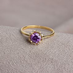 Amethyst helps to reduce stress, increase attention and concentration, and provide emotional balance. Our 14K Solid Gold round amethyst ring surrounded by real diamonds is suitable for daily use with its special design and will be your indispensable jewelry that you can use on your special days. A stylish jewel for you and your loved ones. Time to pamper yourself and your loved ones... Amethyst is the birthstone for those born in February. 🤍🤍 Special gifts for your special moments. We produce Round Amethyst Ring, Round Purple Birthstone Ring Gift, Purple Round Birthstone Ring Gift, Lavender Birthstone Promise Ring, Fine Jewelry Amethyst Halo Ring Gift, Purple Birthstone Ring With Prong Setting As Gift, Lavender Birthstone Ring For Gift, Lavender Birthstone Ring As Gift, Round Amethyst Halo Ring For Gift