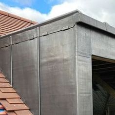 the roof of a house with a metal sheet covering it