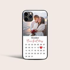 an iphone case with a photo and date on the front, in red text that says october