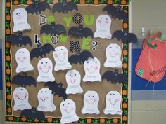 a bulletin board decorated with halloween decorations