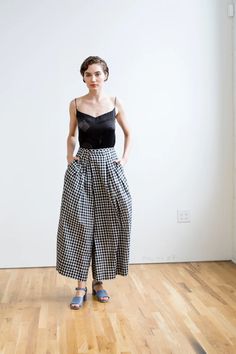 Buy Frida Pants | Black & White Chex Bottoms – Rujuta Sheth Summer Wide Leg Plaid Bottoms, Summer Plaid Wide Leg Bottoms, Summer Plaid Wide-leg Bottoms, High Waist Plaid Pleated Skirt, Casual Gingham Pleated Skirt, Plaid High Waist Bottoms For Day Out, Chic Pleated Skirt Pants For Spring, Plaid Trousers For Spring, Chic Plaid Wide Leg Pants