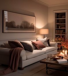 a living room filled with lots of furniture and candles on top of a coffee table