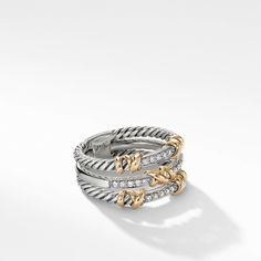 In the Helena Collection, David Yurman returns to the longer, leaner twist of his first handmade Cable bracelet, wrapping the iconic form with 18K yellow gold threads accented with hand-set pave diamonds. Sterling Silver with 18-karat Yellow Gold Pave Diamonds, 0.21 total carat weight Ring, 12mm This ring is a size 8 Style Number: R16394DS8ADI8 Yurman Ring, Petite Jewelry, David Yurman Ring, Cable Bracelets, Metal Shop, Custom Jewelry Design, Wrap Rings, Diamond Sizes, High Jewelry