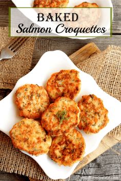 baked salmon croquettes on a white plate