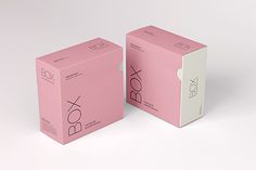 two pink boxes sitting side by side on top of each other in front of a white background