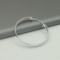 These are big sterling silver hoops, with a flat surface. Dimensions: 4 X 35 mm Weight: 5.2 gm These earrings are made of 925 hypoallergenic sterling silver. All my pieces are sent in a gift box. I can include a personal message from you if needed. You are welcome to contact me at... bhavnakwintra1956@gmail.com More Silver Hoops: https://www.etsy.com/your/shops/TheSilverGame/tools/listings/section:26305414 More Silver Earrings: https://www.etsy.com/your/shops/TheSilverGame/tools/listings/section Minimalist Hoop Sterling Silver Bracelets, Minimalist Sterling Silver Hoop Bracelets, Simple Adjustable Sterling Silver Hoop Earrings, Minimalist Adjustable Hoop Jewelry, Adjustable Minimalist Circle Hoop Earrings, Minimalist Adjustable Circle Hoop Earrings, Silver Hoop Bracelets For Everyday, Minimalist Adjustable Hoop Earrings, Adjustable Silver Hoop Earrings For Anniversary