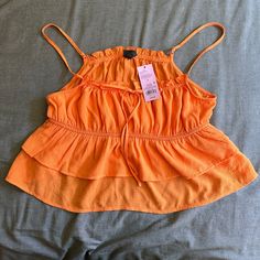 Cleaning Out The Closet Sale Brand New/Never Worn! Perfect For Spring And Summer Bundle And Save Orange Ruffled Tops For Vacation, Orange Ruffled Top For The Beach, Orange Ruffled Top For Beach, Summer Orange Ruffle Tops, Orange Ruffled Summer Top, Summer Orange Ruffled Tops, Orange Summer Top With Ruffles, Summer Orange Top With Ruffles, Orange Sleeveless Ruffled Top