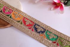 a close up of a decorative ribbon on a table