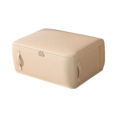 a white suitcase sitting on top of a white floor