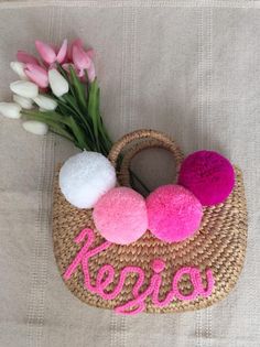 Mia Straw Bag monogram name with Pom Pom for Bridesmaid Gift Wedding Party and Colorful Day  Shopping and  Go to The Beach.  They made of Water Hyacinth bag with Tassel and vivid Pom Pom. We disinfected the bag and ensure they ultra clean.♥ Plain Straw Bag wedding party gift https://www.etsy.com/listing/563807593/straw-bag-woven-bag-straw-basket-straw?ref=shop_home_active_1How to ORDER  ??1. You can select Size of bag.2. Inform pom pom color Black and White or in pic3. inform alphabet and color Handmade Pink Straw Bag For Beach, Personalized Handmade White Bags, Handmade White Bags For Personalized Gifts, White Handmade Bags For Personalized Gifts, Spring Beach Bag With Tassels, White Bags With Custom Name For Personal Use, White Bag With Custom Name For Personal Use, Eco-friendly Pink Beach Bag As Gift, Beach Bag Bridesmaid Gift