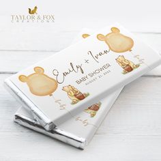 two chocolate bars with winnie the pooh characters on them sitting next to each other