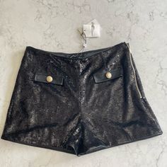 Shimmery High Waisted Sequin Shorts With Vegan Leather Faux Pockets. Fully Lined. Black In Color With Gold Statement Buttons. 95% Polyester And 5% Spandex Size 8 Waist 15.5” Rise 3” New With Tags! Retail $215 Fitted Party Bottoms With Short Inseam, Fitted Bottoms With Short Inseam For Party, Elegant Fitted Shorts For Going Out, Elegant Fitted Shorts For Date Night, Fitted High-waisted Shorts For Night Out, Elegant Fitted Shorts For Night Out, Fitted Party Bottoms With Built-in Shorts, Chic Bottoms With Short Inseam For Night Out, Elegant Shorts For Night Out With Short Inseam